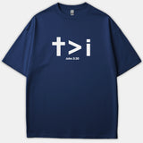 A navy blue Christian t-shirt featuring a bold white graphic displaying a cross, a greater-than symbol, the letter i, and the scripture reference John 3:30.
