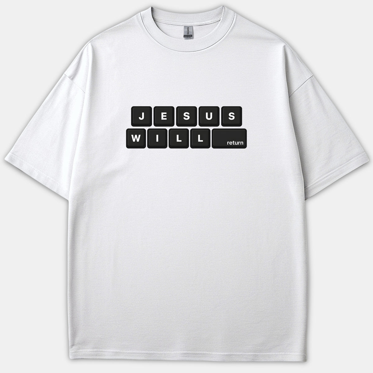 A white Christian t-shirt featuring black computer keyboard keys that spell out JESUS WILL return across two rows.