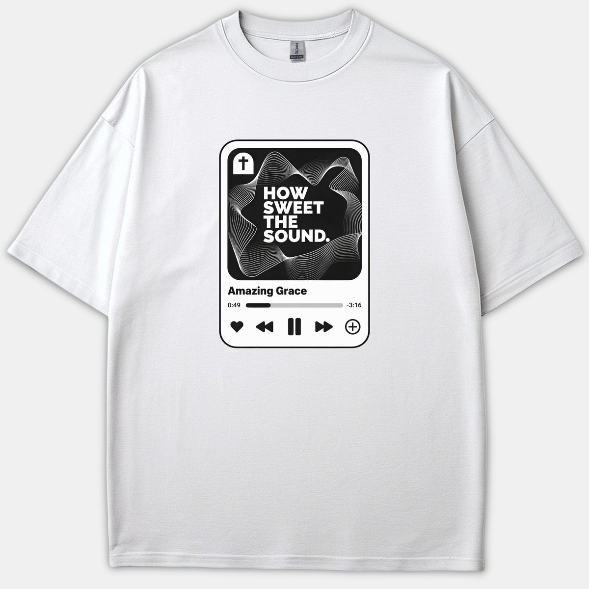 A white Christian t-shirt featuring a music player graphic design with a cross icon, soundwaves, and the lyrics How Sweet The Sound and Amazing Grace.