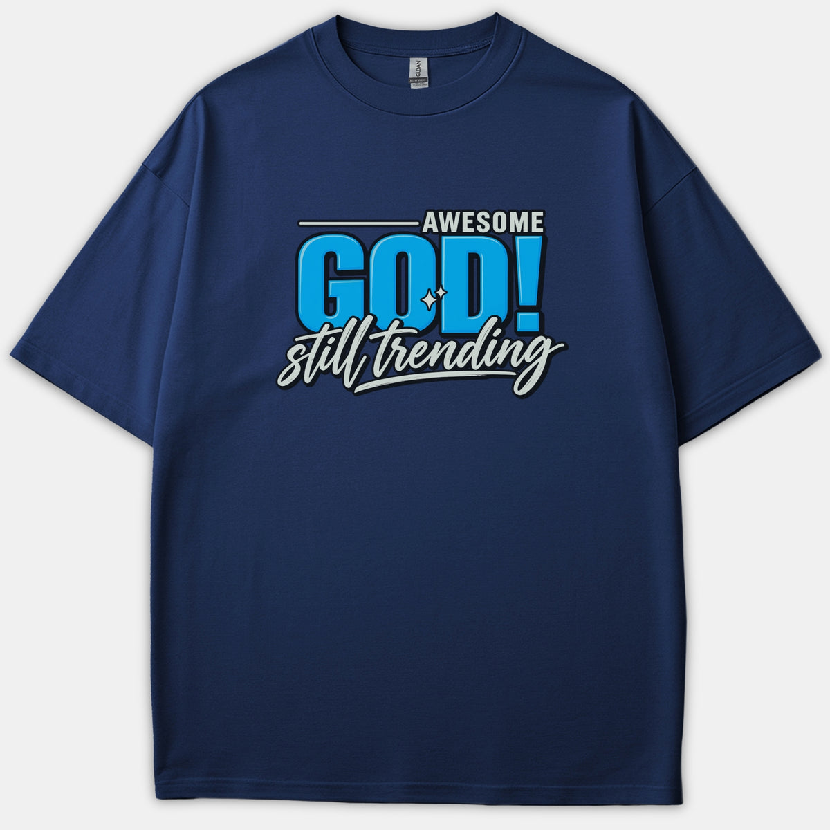 A navy blue Christian t-shirt featuring a bold graphic design that reads 'AWESOME GOD! still trending' in vibrant blue and white typography.