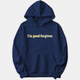 A navy blue hoodie featuring the text 'I'm good forgiven' printed across the chest with the word 'good' crossed out in gold.