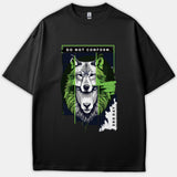 A black T-shirt featuring a graphic print of a wolf face in green and white tones with the caption DO NOT CONFORM.