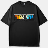A black t-shirt featuring a framed graphic with white text reading 'GOD SAID (LET THERE BE LIGHT)' surrounding vibrant Hebrew lettering in an orange, yellow, and blue gradient.
