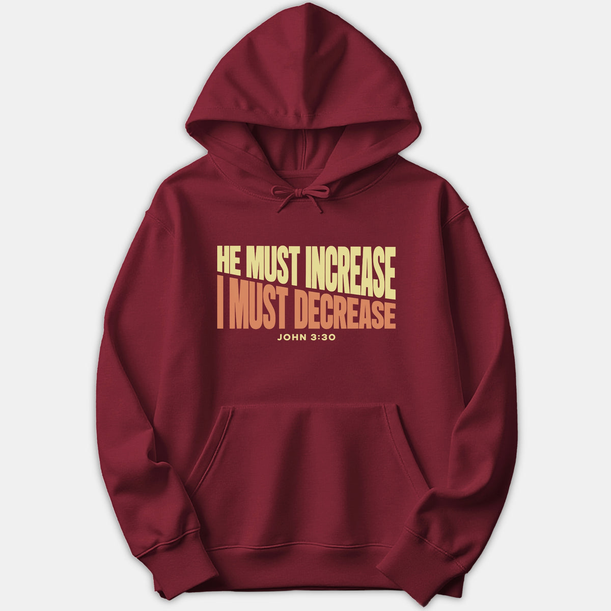 A dark red hoodie featuring a bold graphic print that reads He Must Increase I Must Decrease John 3:30 in yellow and orange typography across the chest.