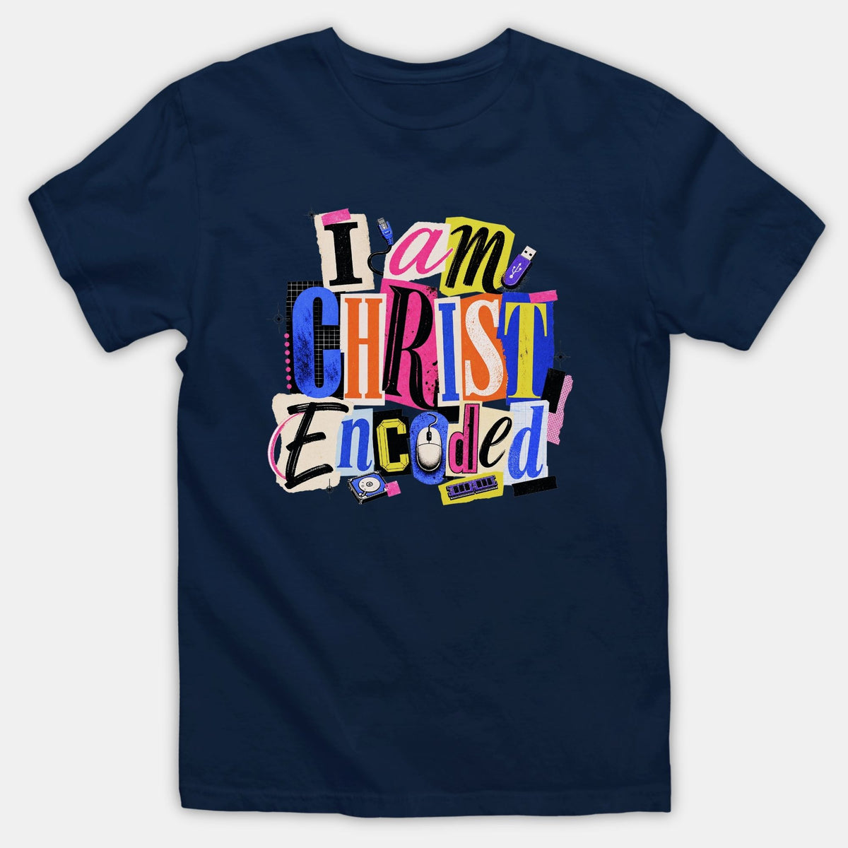 A navy blue T-shirt featuring a colorful ransom-note collage graphic that reads 'I am CHRIST Encoded' surrounded by computer accessories like a mouse and USB drive.