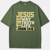 An olive green Christian T-shirt featuring bold, distressed graphic text that reads 'Jesus The Way Truth Life John 14:6'.
