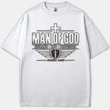 A white Christian t-shirt featuring a black graphic design with a cross, shield, sword, and the words Man of God, Husband, Dad, Protector, and Joshua 24:15.