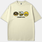 A beige T-shirt featuring a Christian rebus graphic with a donut, a bee, and a scared face emoji above the printed text ISAIAH 41:10.