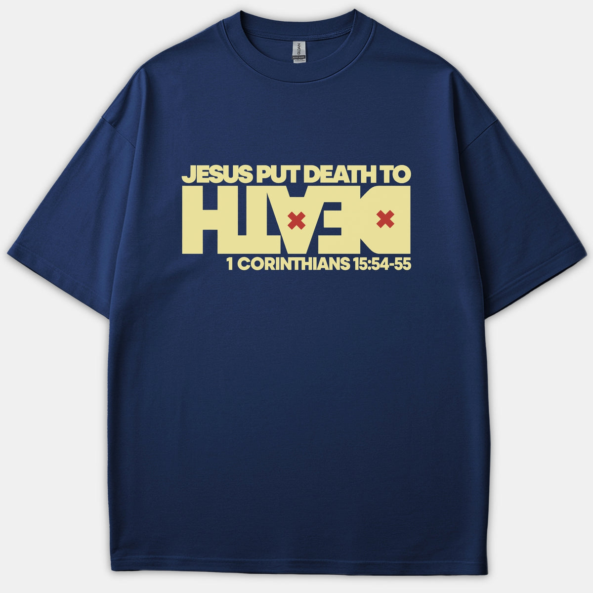 A navy blue Christian t-shirt printed with graphic text reading 'JESUS PUT DEATH TO DEATH' along with the scripture reference 1 Corinthians 15:54-55.