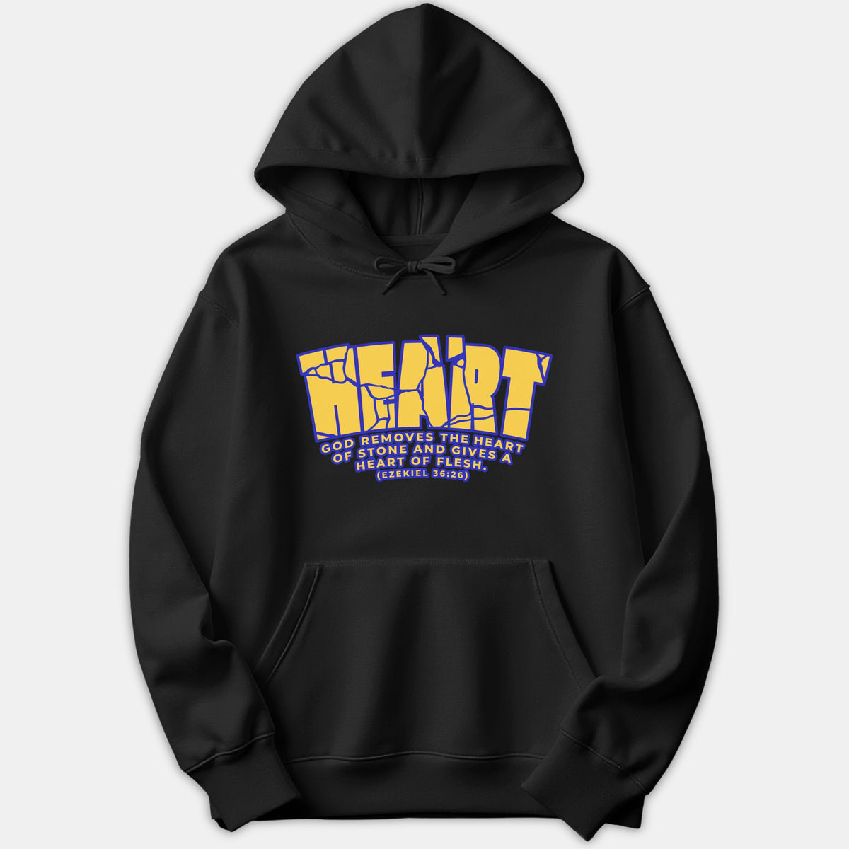 A black pullover hoodie featuring a bold yellow cracked-stone graphic reading HEART and Bible verse Ezekiel 36:26 printed below in blue and yellow.