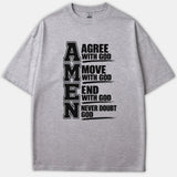 A heather gray t-shirt featuring a bold black graphic layout of the word AMEN spelled out as an acronym for Agree, Move, End, and Never Doubt God.
