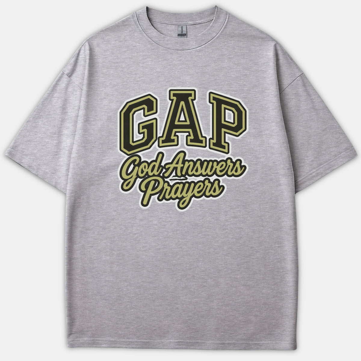 A gray Christian t-shirt featuring an athletic-style GAP logo with the phrase 'God Answers Prayers' printed in gold, black, and white.