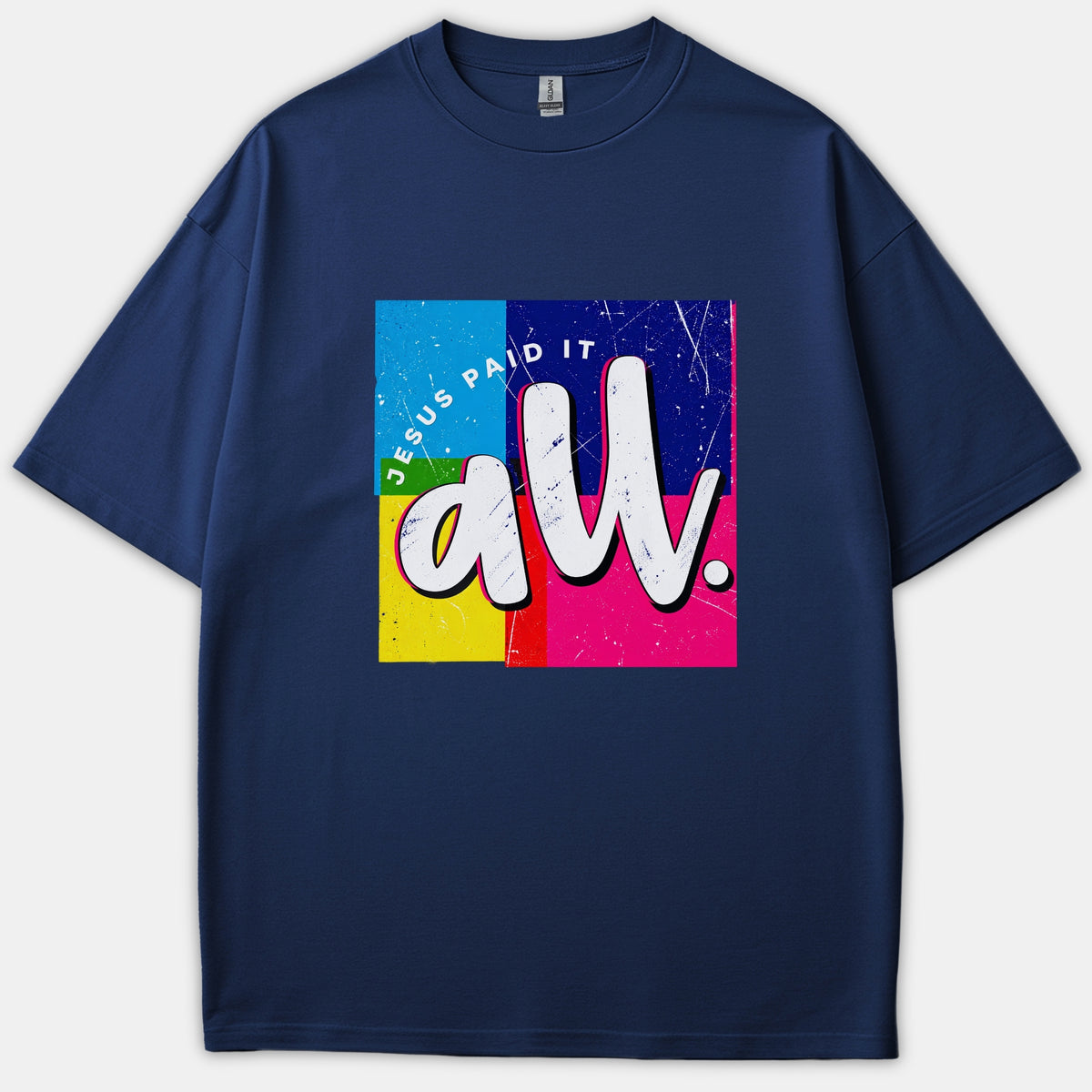 A navy blue Christian t-shirt featuring a colorful color-blocked square graphic displaying the text 'Jesus Paid It All' in white lettering.