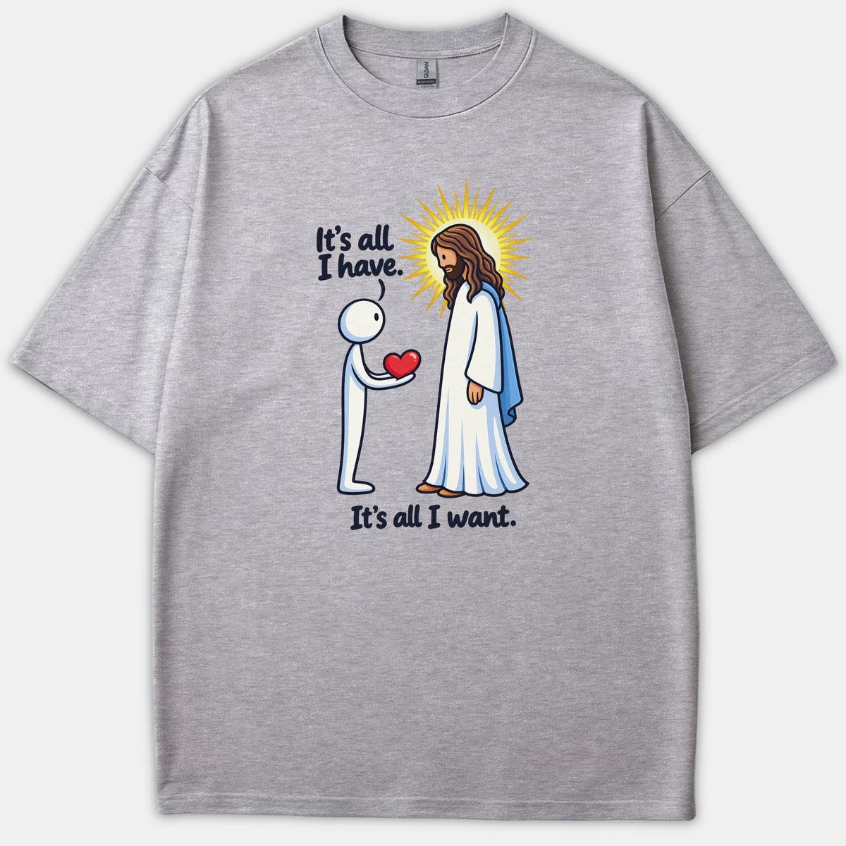 A gray Christian t-shirt featuring a cartoon stick figure offering a red heart to Jesus under the text, 'It's all I have. It's all I want.'