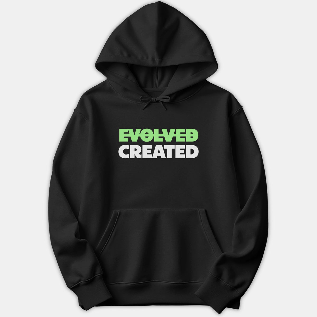 A black hoodie featuring the word EVOLVED crossed out in green above the word CREATED printed in bold white text across the chest.