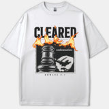 A white Christian t-shirt featuring a graphic design of a judge's gavel engulfed in flames with the text 'CLEARED OF ALL CHARGES condemnation ROMANS 8:1'.