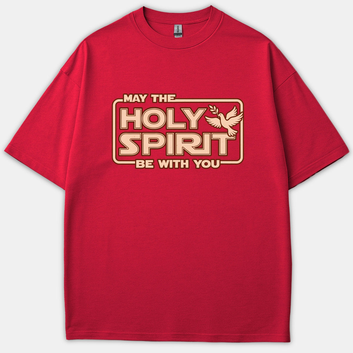 A red T-shirt featuring a Star Wars inspired logo graphic that reads MAY THE HOLY SPIRIT BE WITH YOU accompanied by a flying dove with an olive branch.