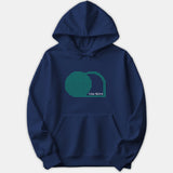 A navy blue pullover hoodie featuring a green halftone dotted graphic of an empty tomb alongside the scripture reference 1 Cor 15:3-4 printed in white.