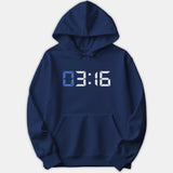 A navy blue pullover hoodie featuring a digital clock display reading 03:16 printed across the chest in white and light blue.