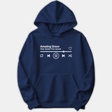 A navy blue pullover hoodie featuring a white music player style graphic printed on the chest with the text Amazing Grace How Sweet The Sound.
