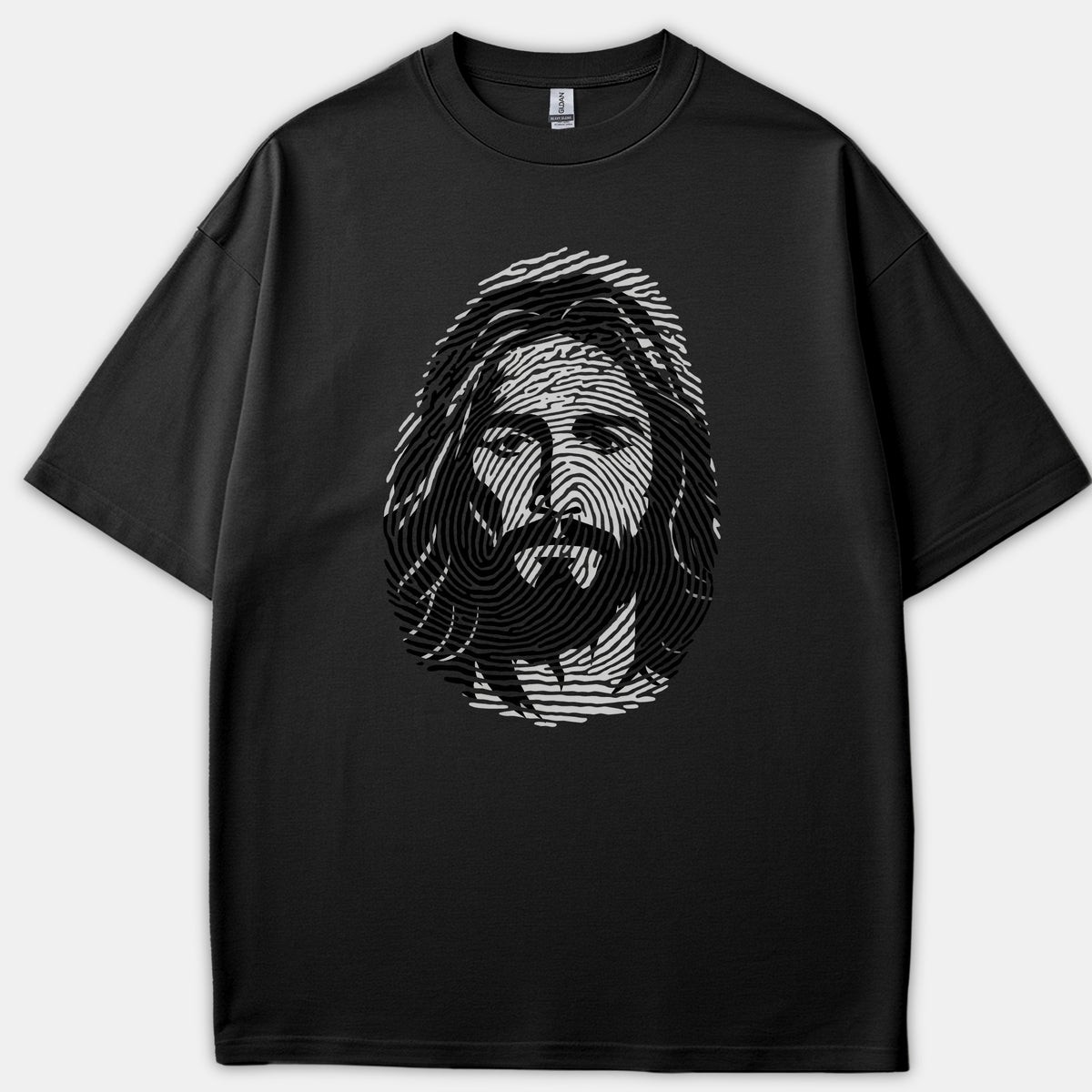 A black t-shirt featuring a stylized graphic portrait of Jesus Christ created inside a white fingerprint design.