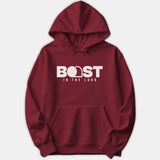 A maroon red Christian hoodie featuring the graphic text 'BOAST IN THE LORD' printed in bold white across the chest.