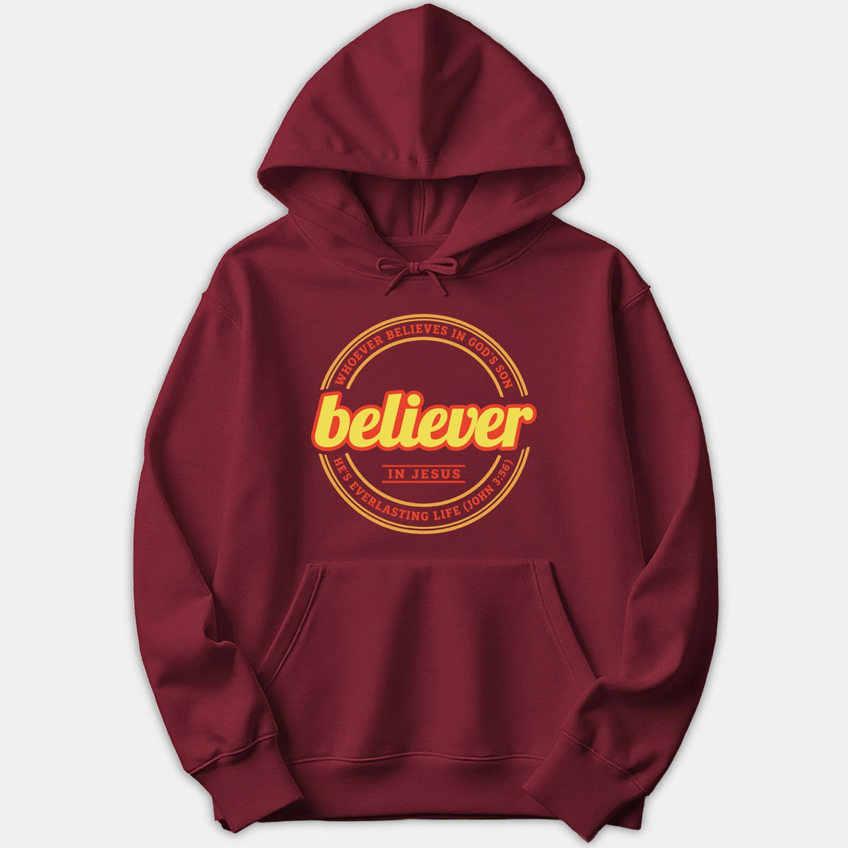 A maroon red hoodie featuring a circular yellow and orange graphic that reads Believer In Jesus along with scripture text from John 3:36.
