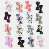 # 302/Lot1 - Baby Girl Tic-Tac Bows