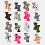 # 302/Lot1 - Baby Girl Tic-Tac Bows