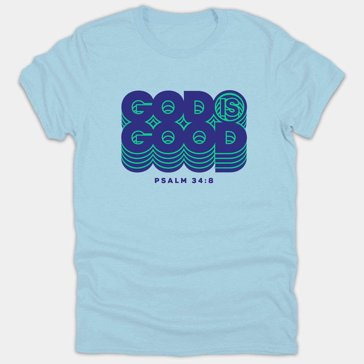 A light blue t-shirt featuring a retro layered graphic that reads 'GOD IS GOOD' with 'PSALM 34:8' printed underneath in navy blue and green.