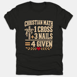 A black t-shirt featuring a Christian graphic that reads 'Christian Math 1 Cross + 3 Nails = 4 Given' with a wooden cross and red heart.
