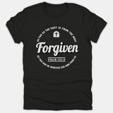 A black Christian T-shirt featuring a circular graphic print with the word Forgiven, a cross icon, and scripture from Psalm 103:12.