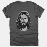 A gray t-shirt featuring a unique graphic of Jesus Christ's portrait intricately styled inside a fingerprint pattern printed in black and white.