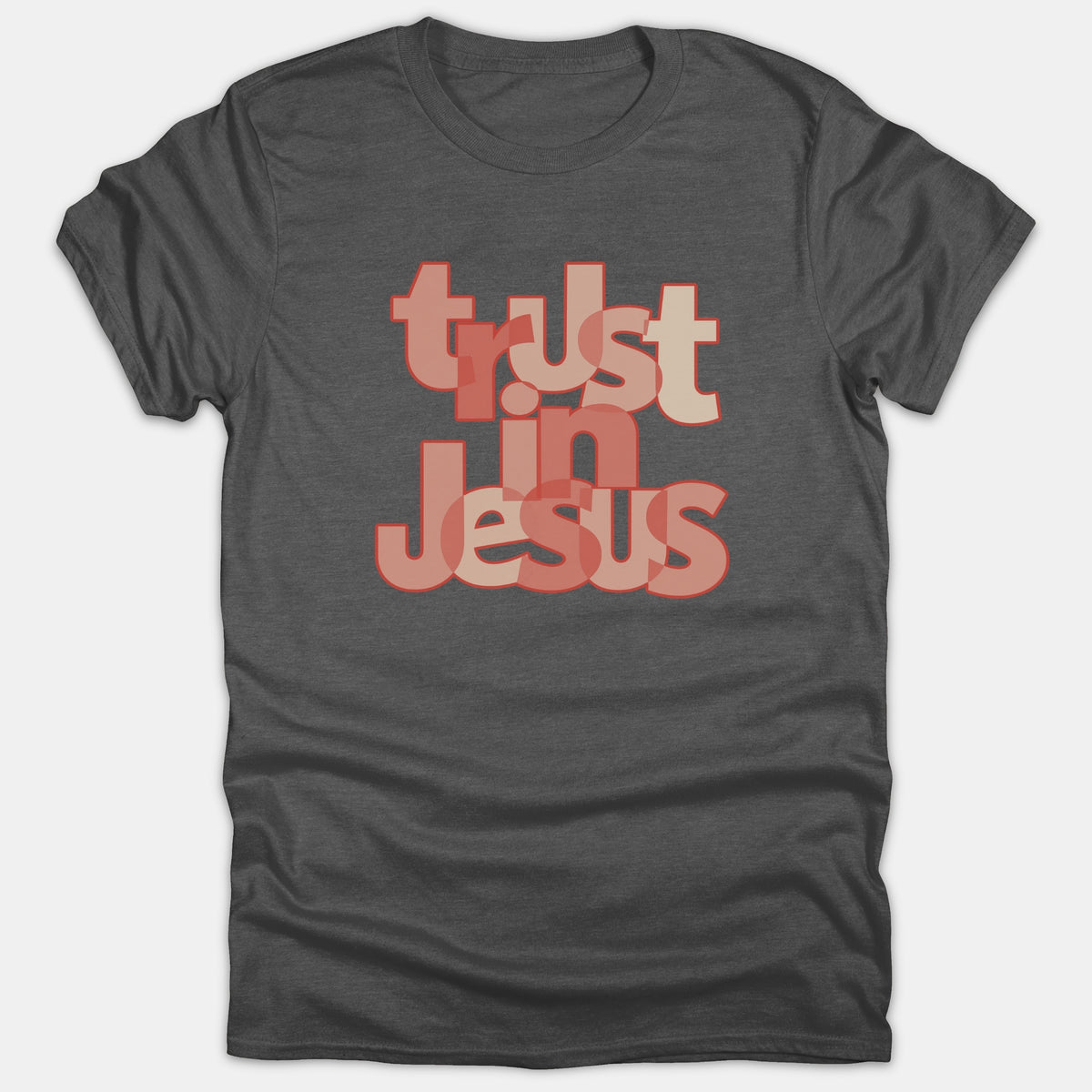 A dark gray t-shirt featuring the phrase 'trust in Jesus' printed in overlapping, multi-shaded coral pink and red typography on the chest.