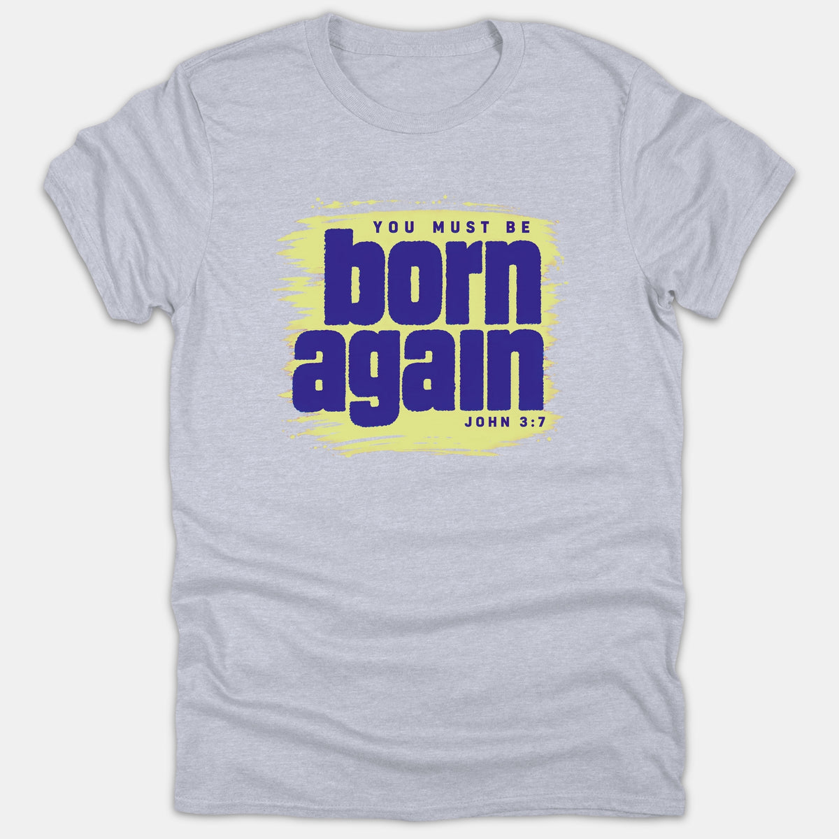 A heather gray Christian t-shirt featuring a yellow paint stroke background with purple text reading 'YOU MUST BE BORN AGAIN' and the Bible reference 'JOHN 3:7'.
