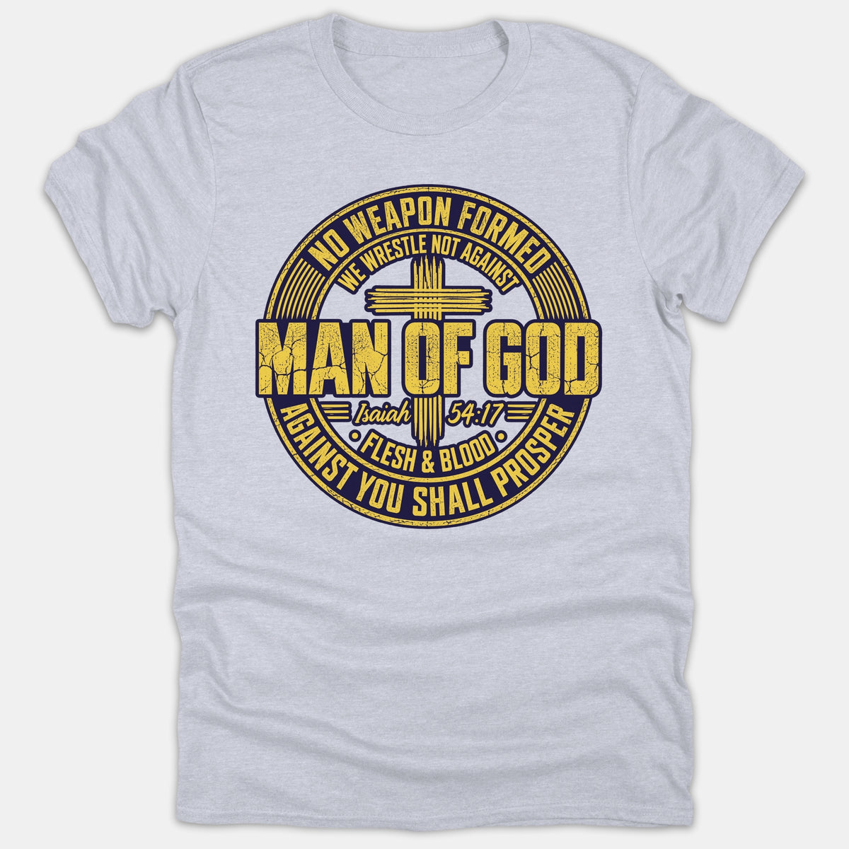 A light gray t-shirt featuring a circular navy and yellow graphic emblem with a cross, 'Man of God', and scripture text from Isaiah 54:17.