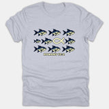 A heather gray t-shirt displaying stylized fish swimming together alongside a yellow Ichthys symbol swimming the opposite way, above the text ROMANS 12:2.