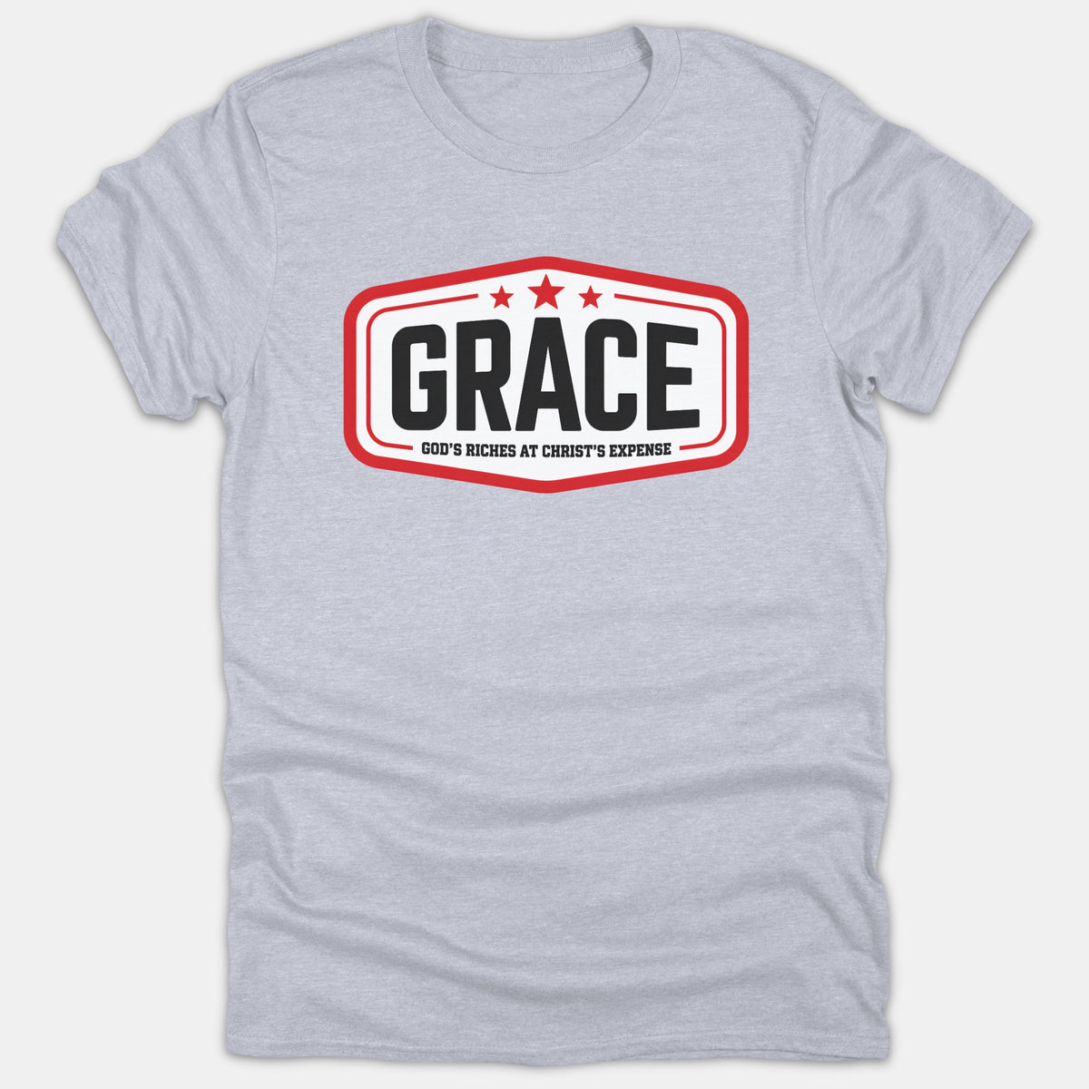 A light gray Christian t-shirt featuring a red framed badge design with three stars and bold text reading GRACE, God's Riches At Christ's Expense.