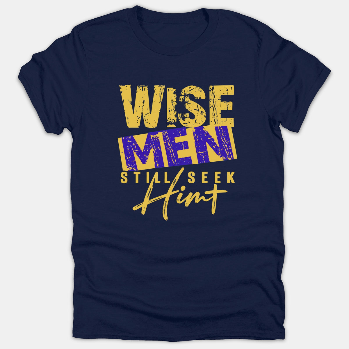 A navy blue t-shirt featuring the Christian message 'Wise Men Still Seek Him' in a bold yellow and purple distressed typography style.