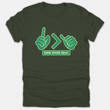 A dark green Christian t-shirt featuring a graphic design of hand gestures around a greater-than sign above the text GOD OVER SELF.